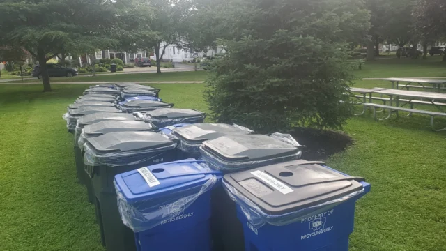 How many extra refuse containers are brought to The Green for Laurel Festival? This many.
